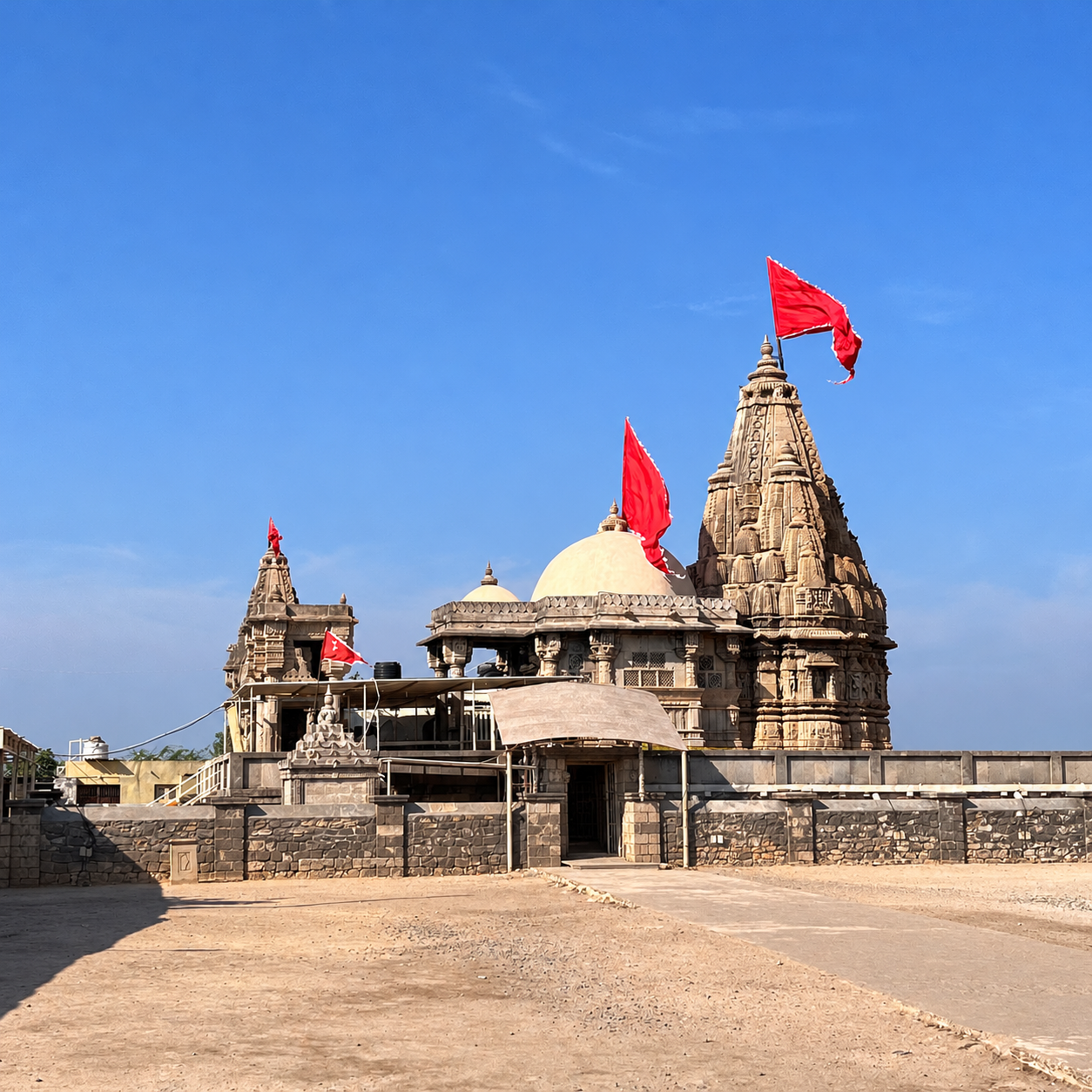 The present Rukmini Devi Temple and its carved tower, emptied of visitors.